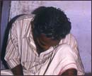A weaver of Pathamadai at work